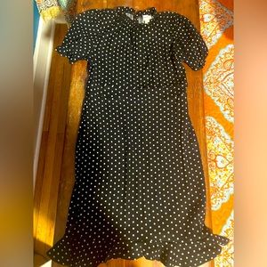 Polka dot dress size M runs small.